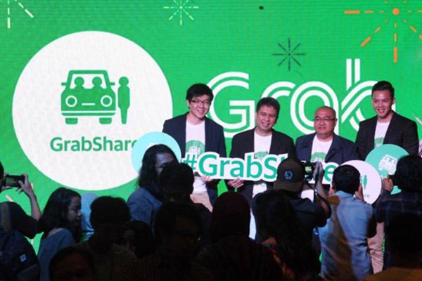 TARIF TAKSI ONLINE : Grab Butuh Waktu Adaptasi 2 Bulan