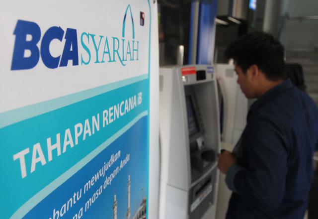 UANG ELEKTRONIK : BCA Syariah Incar Potensi Sektor Transportasi