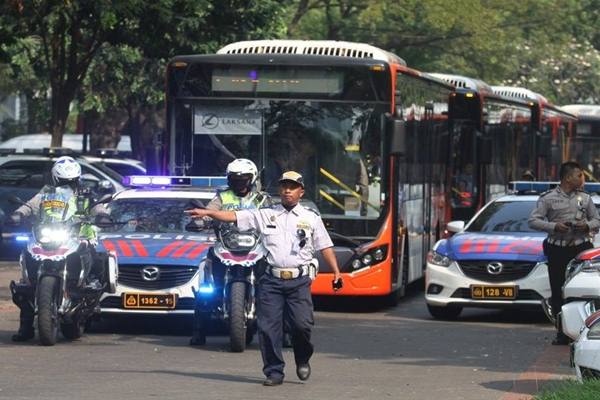 PENGAMANAN RUTE WISMA ATLET—VENUE  : Utak-Atik Trafik Demi Waktu Tempuh 