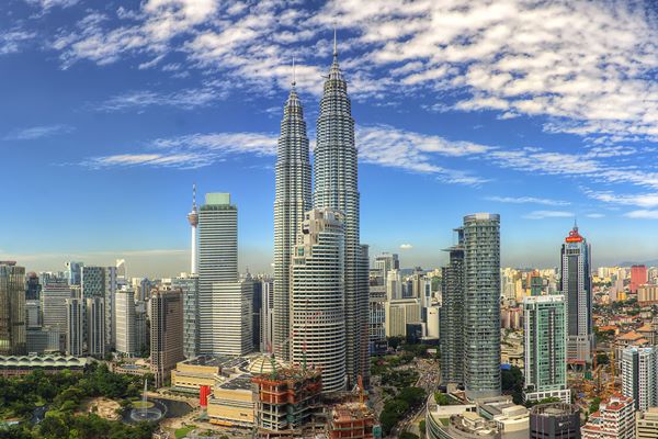 ATURAN PROPERTI : Malaysia Permudah Asing Beli Apartemen