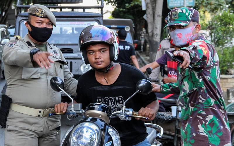 PROTOKOL KESEHATAN : Penanganan Covid-19 Dinilai Membaik