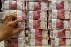 Rupiah Ditutup Melemah 0,16% ke Rp12.180/US$