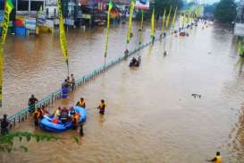 Yayasan Podomoro Land Gandeng TNI AD Bantu Korban Banjir Jakarta