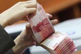 Rupiah Ditutup Melemah 0,4% ke Posisi Rp11.825/US$