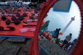 LIBUR LEBARAN 2014: Di Monas, Sekali Parkir Rp25.000