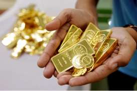 HARGA EMAS ANTAM (7/8/2014): Naik Rp6.000/Gram, Buyback Rp537.000/Gram