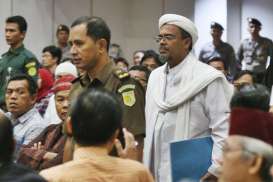 Rizieq Tersangka, Ini Pasal dan Alat Bukti Temuan Polisi