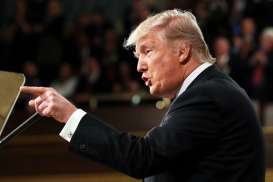Dipecat dari Gedung Putih, Bannon Janji Tetap Loyal Terhadap Trump