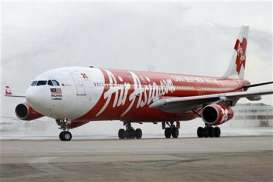 HASIL RUPSLB  : Backdoor Listing Air Asia Disetujui