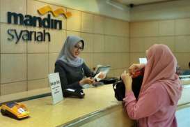 Dana Mengendap Uang Elektronik Syariah Harus Ditaruh di Bank Syariah