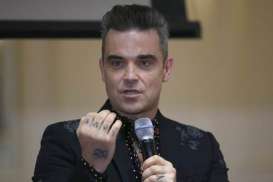 PIALA DUNIA 2018: Robbie Williams Tak Akan Nyanyikan Party Like A Russian di Acara Pembukaan