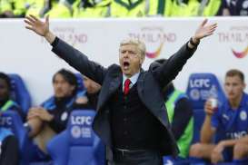 Arsene Wenger Menyesal Tinggal 22 Tahun di Arsenal