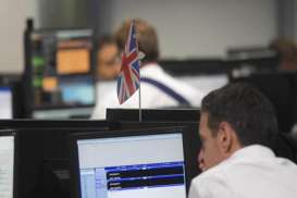 Bursa Global Turun, Pound Sterling Terbebani Keraguan Brexit