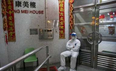 2 Orang Terpapar Virus Corona, Penghuni Apartemen Dievakuasi di Hong Kong