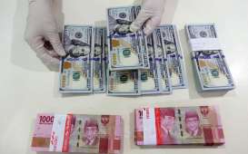 Kurs Jisdor Menguat ke 14.165, Rebound Dolar AS Bebani Rupiah di Pasar Spot