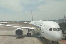 Singapore Airlines Rugi Besar, Harga Saham Jatuh