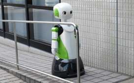 Robot-Robot Tangani Covid-19