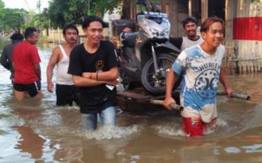 Tips Memperlakukan Motor Saat Banjir