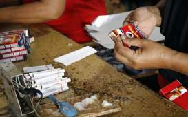 Cukai Rokok Tak Naik pada 2022, Saham Produsen Rokok Kompak Menguat