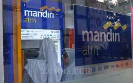 Respons Kebijakan BI, Mulai 12 Juli Tarik Tunai ATM Bank Mandiri Bisa Rp20 Juta