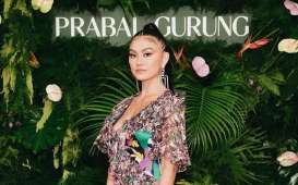 Diwawancara Grammy, Agnez Mo Kenalkan Nasi Padang