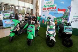 Syarat Daftar Mitra Grab Electric, Potensi 'Gaji' Rp12 Juta per Bulan