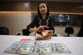 Rupiah Dibuka Menguat, Sentuh Rp15.765 per Dolar AS