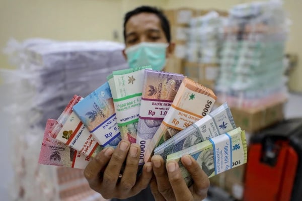 Meski Fluktuatif, Rupiah Berpeluang Menguat Besok