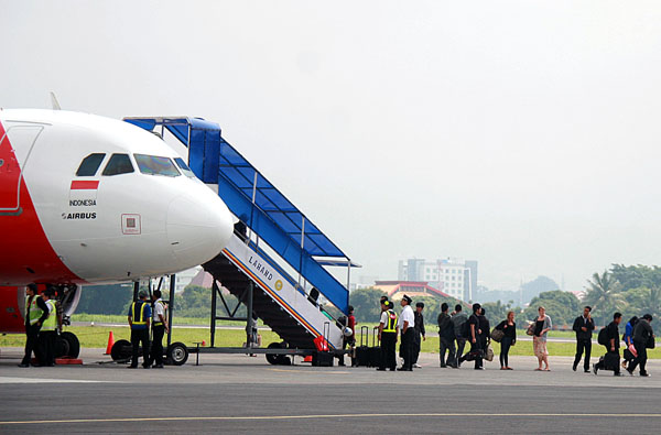  FOTO: Penumpang pesawat jelang Imlek