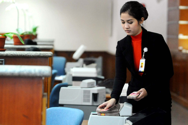  FOTO: Pekan Ini Rupiah Terus Melemah 