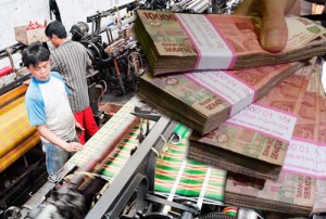  PERTUMBUHAN EKONOMI Akan Tertekan Kenaikan Upah Minimum