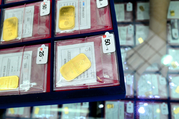  FOTO: Harga Buyback Emas Antam Anjlok Rp23.000/Gram