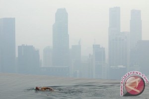  KEBAKARAN HUTAN: Asap Singapura Kian Pekat