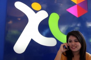  AKUISISI: XL Axiata Pasrah