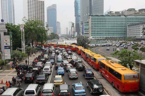  Jokowi Pastikan Tarif Transjakarta Tak Naik Meski Jadi BUMD