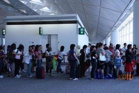 Antrean TKI di Bandara/Bisnis