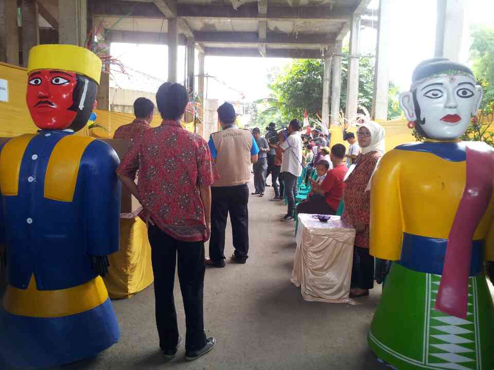  PILEG 2014: Tarik Minat Pemilih, TPS Ini Suguhkan Ornamen Budaya Betawi