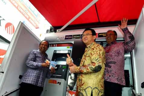  PENGADAAN ATM BANK DKI, Proyek Disetop Karena Tak Efisien