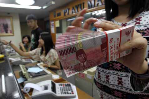  KURS RUPIAH 16 OKTOBER: Melemah 0,27% ke Rp12.260/US$, Pasar Cemas Ekonomi Yunani