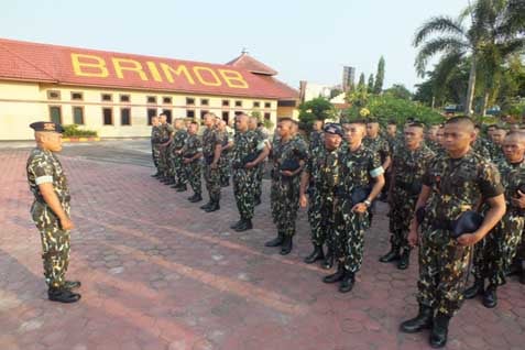  Kompolnas Bahas Penggunaan  Seraganm Loreng Brimob Polri