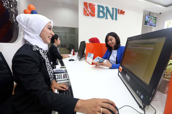  FOTO: Bisnis Asuransi: Pasar Domestik Masih Empuk