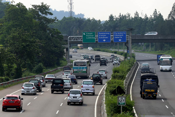  FOTO: MUDIK LEBARAN 2015: Perbaikan Jalan Ditargetkan Rampung Awal Juni