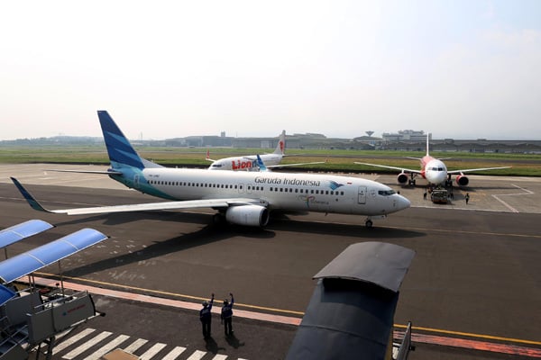  FOTO: Arus Mudik-Balik Lebaran, Bandara Husein Sastranegara Layani 104 Penerbangan Per Hari