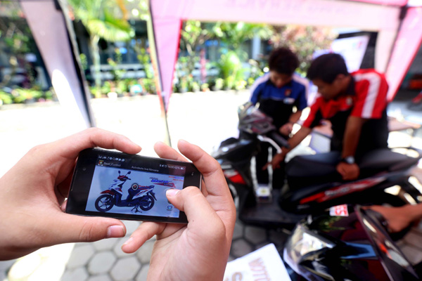  FOTO: Siswa SMKN 8 Bandung Ciptakan Aplikasi Android Pengendali Sepeda Motor