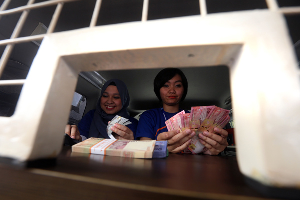  FOTO: KURS RUPIAH: Capai Level Tertinggi Dalam Tiga Pekan, Didorong UU Pengampunan Pajak