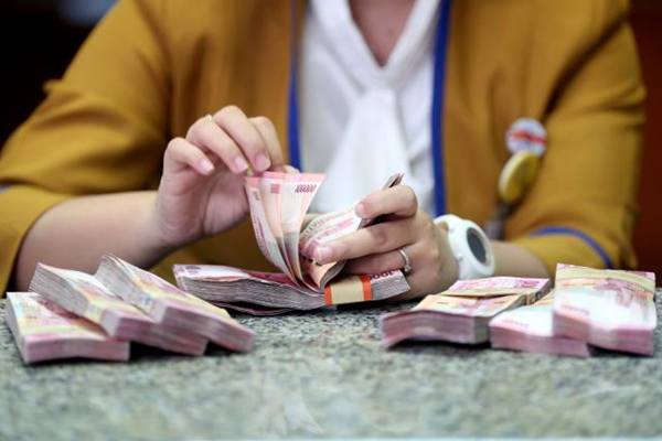  KURS RUPIAH 7 FEBRUARI: Spot Ditutup Melemah 9 Poin ke Level 13.329