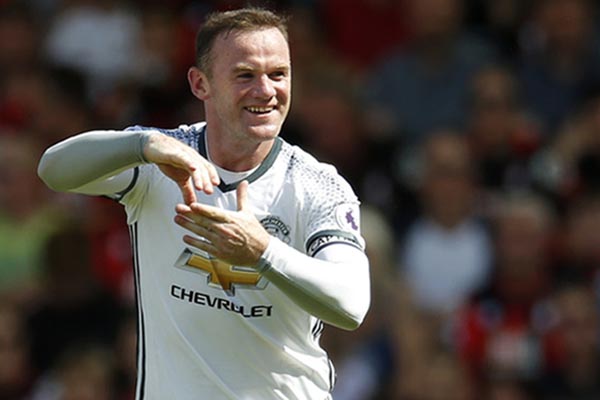 Kapten Manchester United Wayne Rooney. Klub berjuluk Setan Merah meladeni tim kuat Prancis Saint-Etienne di 32 besar Liga Europa./Reuters-Andrew Couldridge
