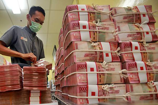  Indeks Dolar AS Flat, Rupiah Ditutup Melemah Tipis di Pasar Spot