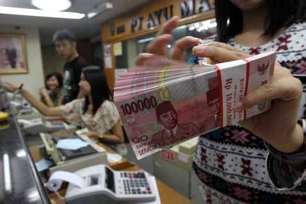  Stagnan di Rp13.361, Rupiah Melemah di Pasar Spot