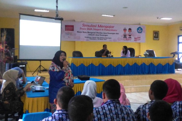  OJK Buat Simulasi Mengajar Literasi Keuangan di Pekanbaru